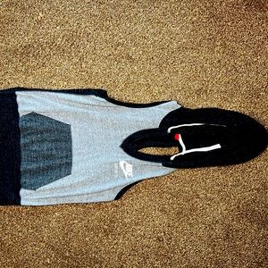 Nike Tank top shirt for exercise the shirt does not have any holes it is elastic